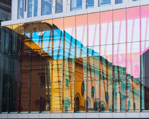 The modern street architecture and office buildings located along Avenida Insurgentes Sur in Mexico City